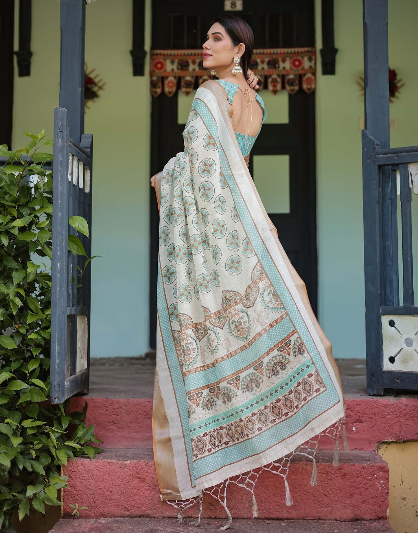 Epitome Cream Printed Saree