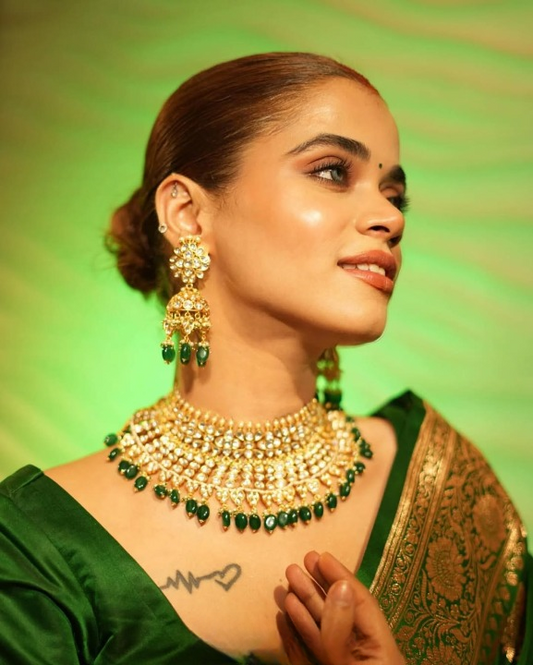 Cornucopian Green Woven Banarasi Saree